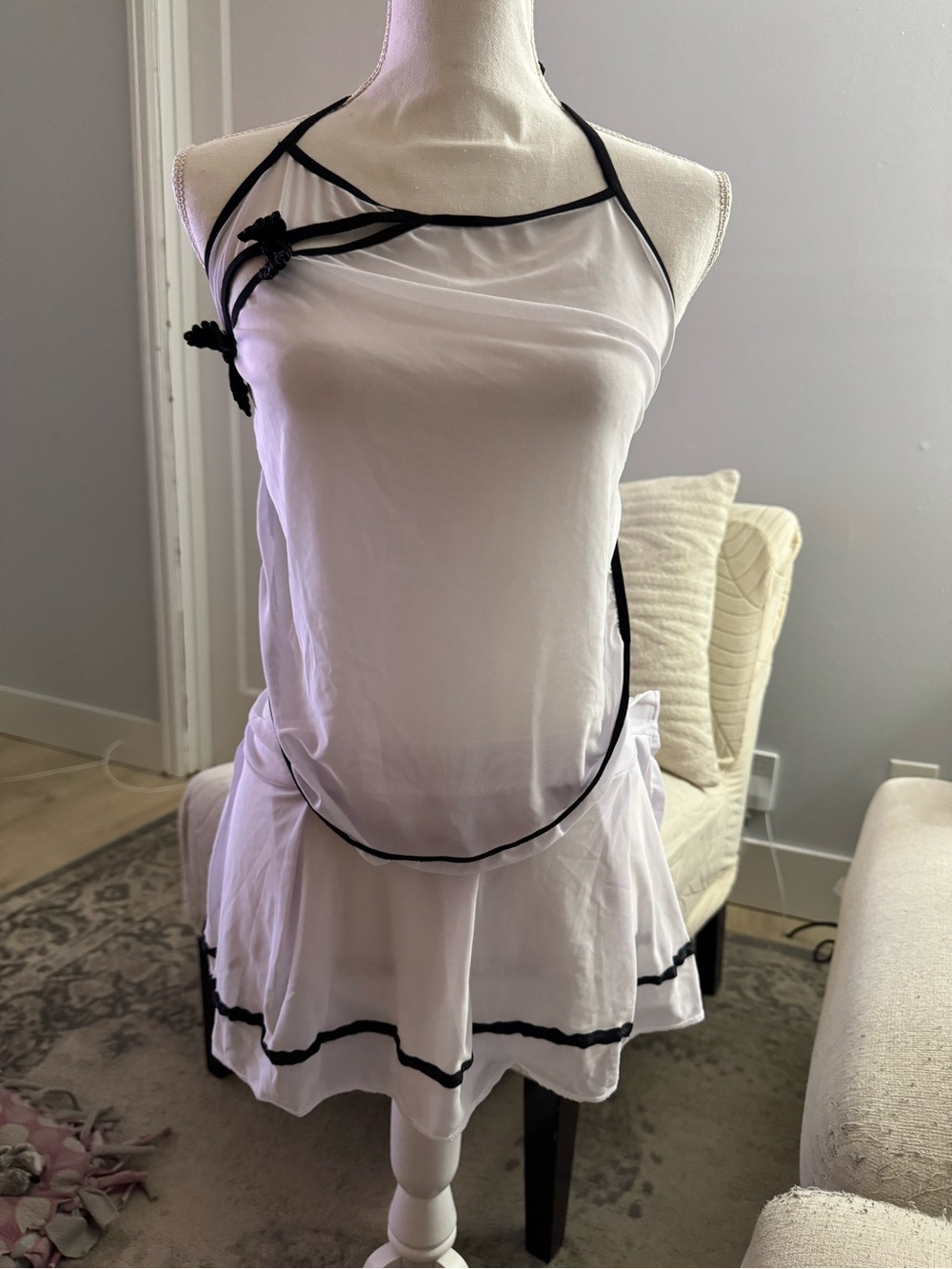 Sheer White Babydoll Dress with Black Trim